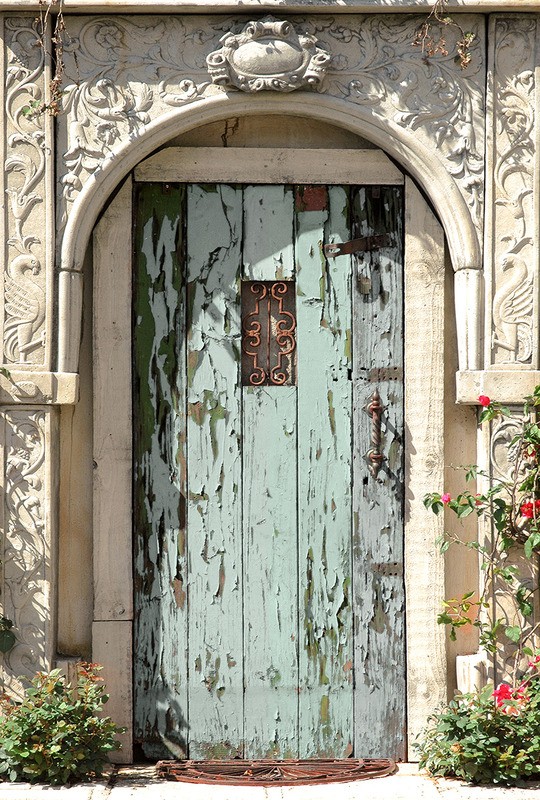 Tuinposter 'Oude deur met ornament'
